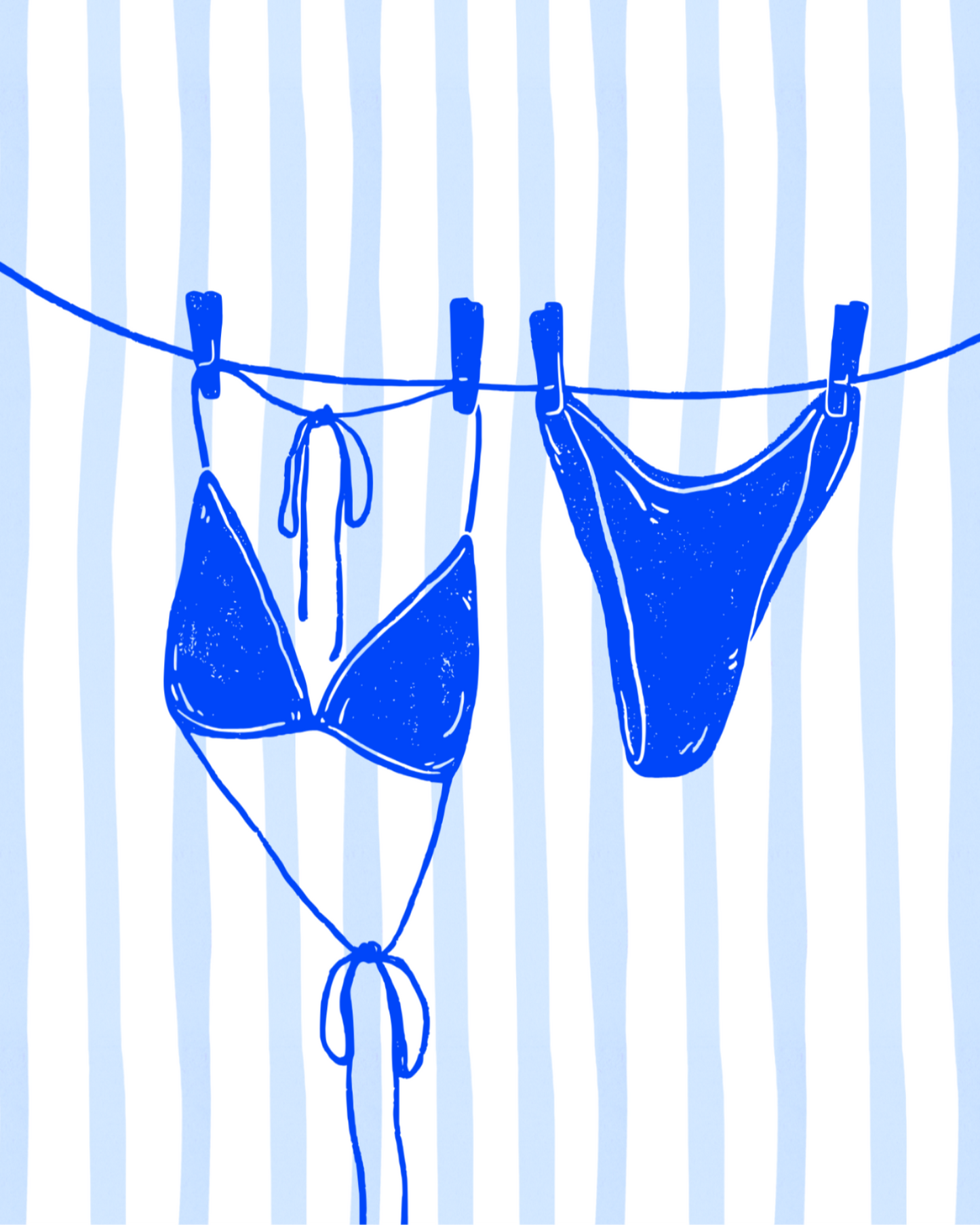 Blue bikini hanging on a clothesline against a striped background