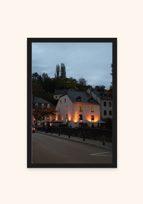 Evening Stroll In The Old Town framed print in a black frame — Art Spectrum