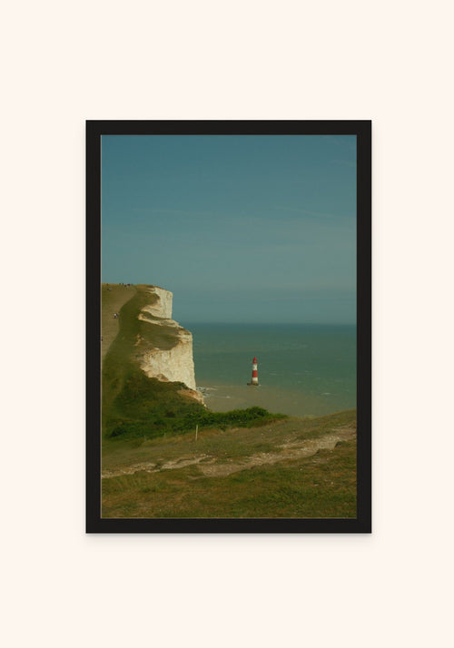 Lighthouse framed print in a black frame — Art Spectrum