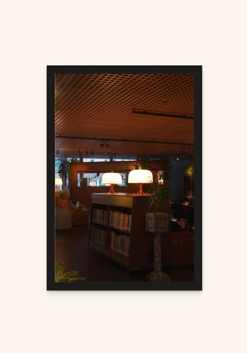 Warmth Between The Shelves 2 framed print in a black frame — Art Spectrum